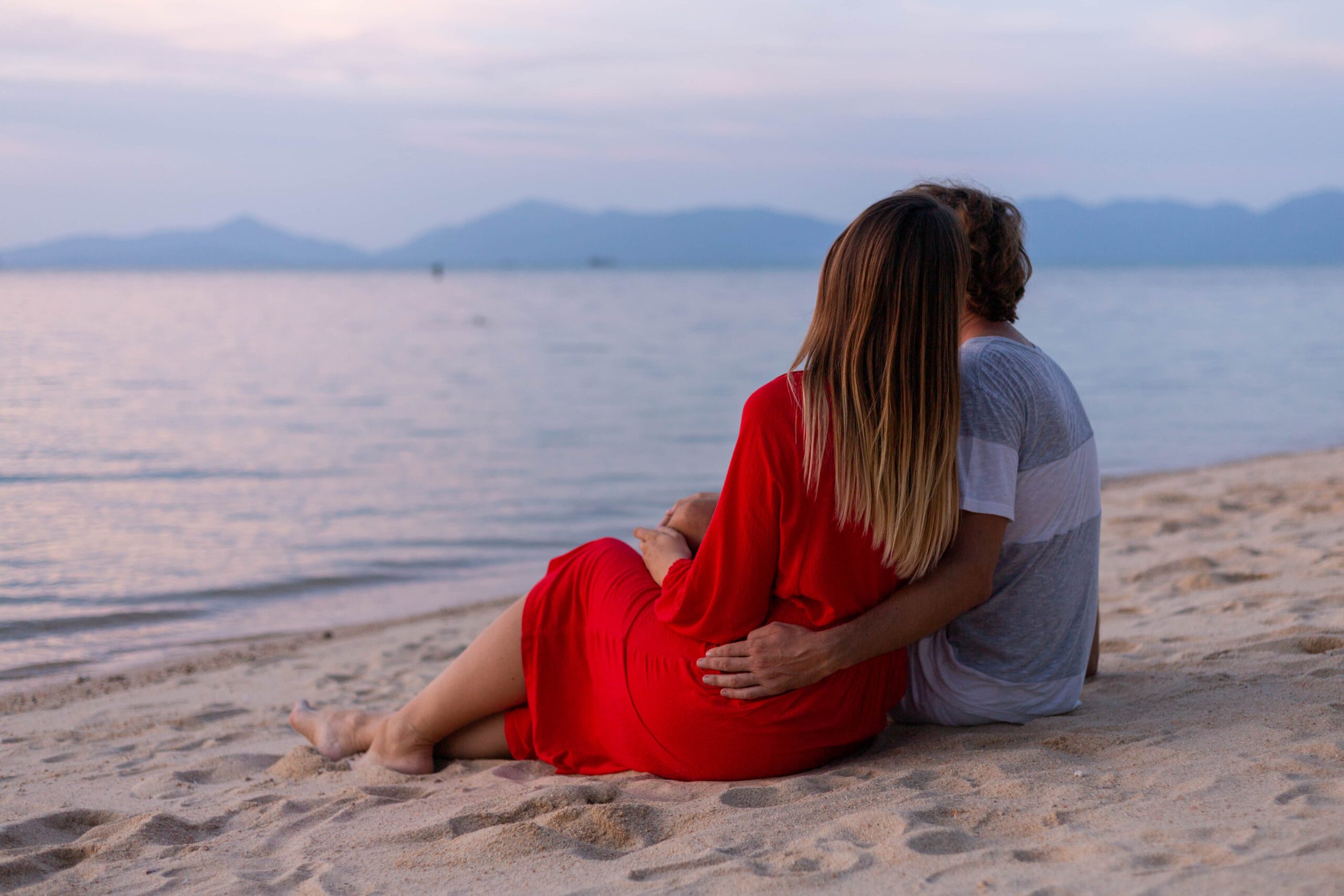 Couples enjoying sunset on the beach